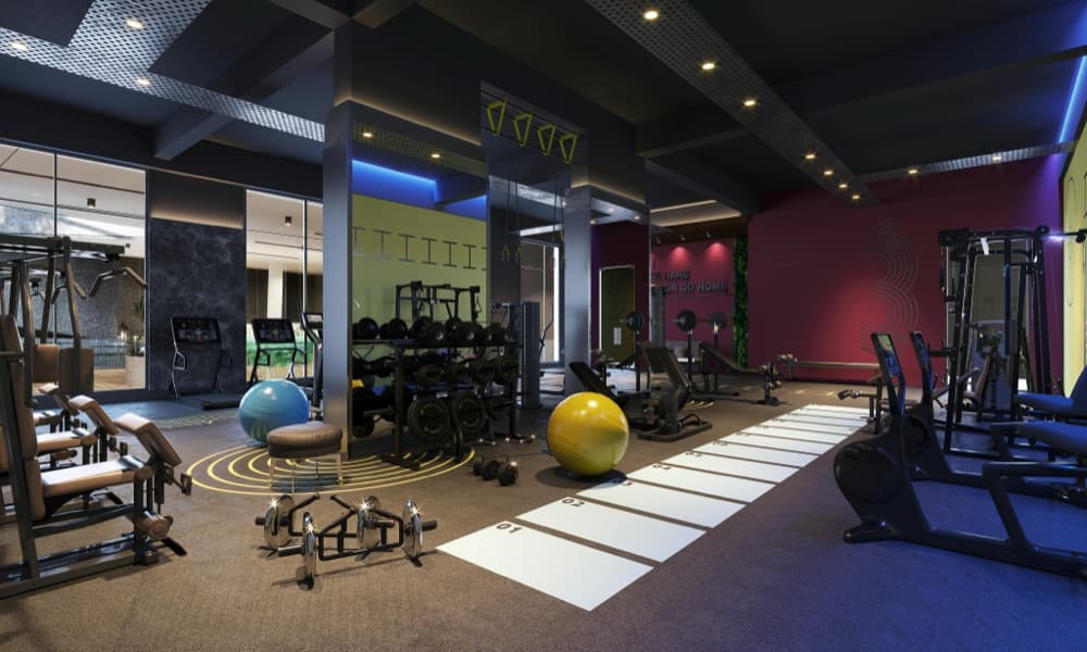 Fitness studio floor with equipment and mood lighting